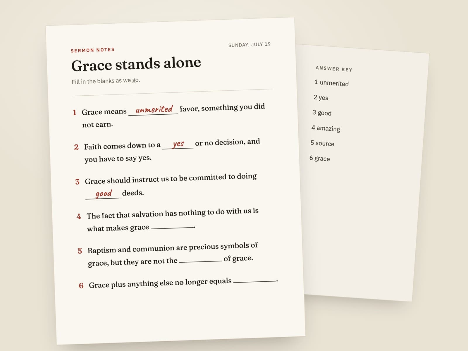A fill-in notes sheet with the first three blanks written in, and an answer key behind it.